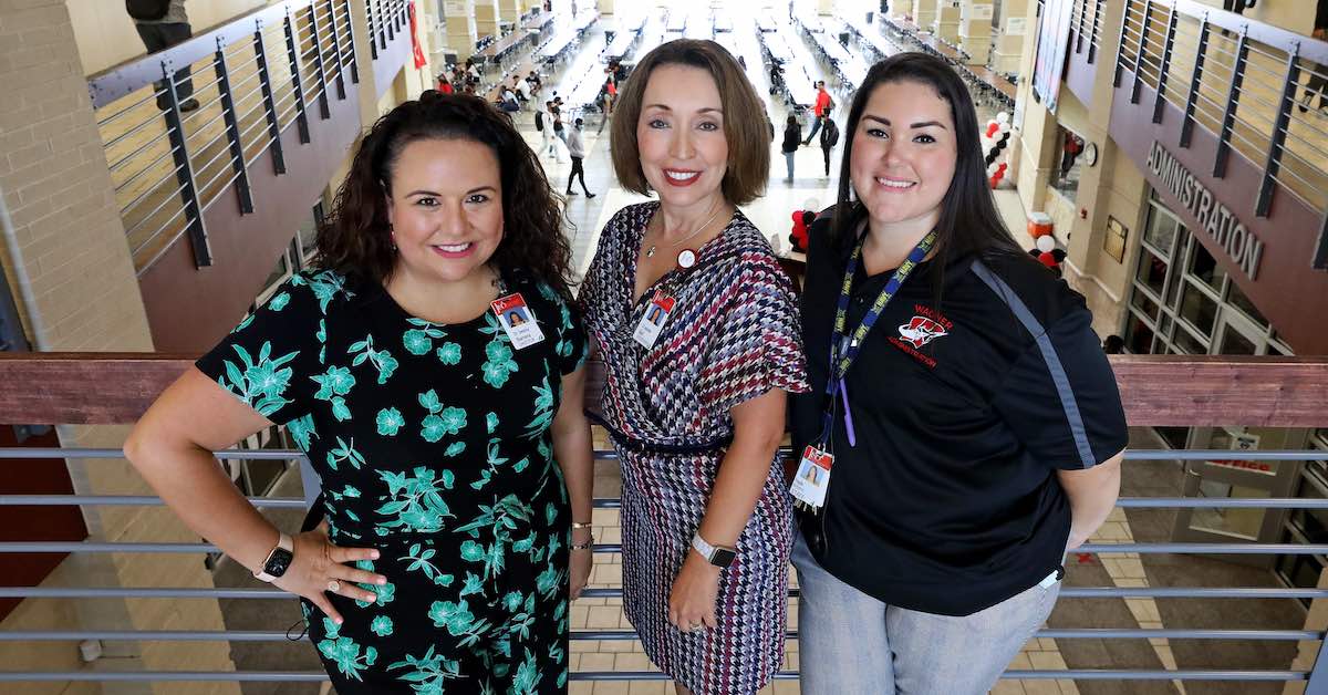 Dr. Destiny Barrera, director of leadership development, Dr. Jeanette Ball, superintendent, and Priscilla Alfaro, principal of Wagner High School in Judson ISD, are photographed together.