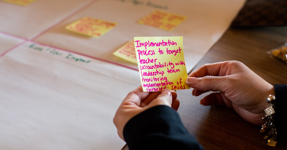 A post-it note is photographed during a Holdsworth Campus Leadership Program workshop session at the Campus on Lake Austin.