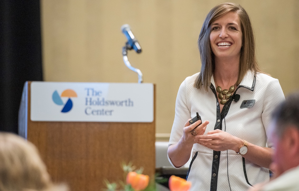 Dr. Lindsay Whorton, President of The Holdsworth Center, photographed speaking to a audience of district leaders.