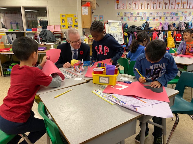 Dr. John Malloy, Director of the Toronto District School Board pictured working with students.