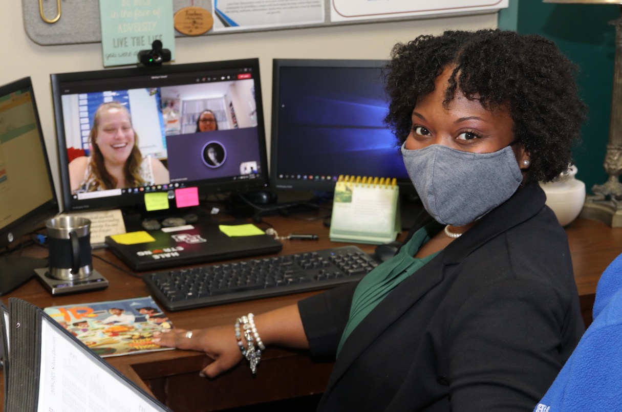 School administrators are photographed in 2020 with face coverings during a virtual meeting on campus at Hale Elementary School in Arlington ISD.