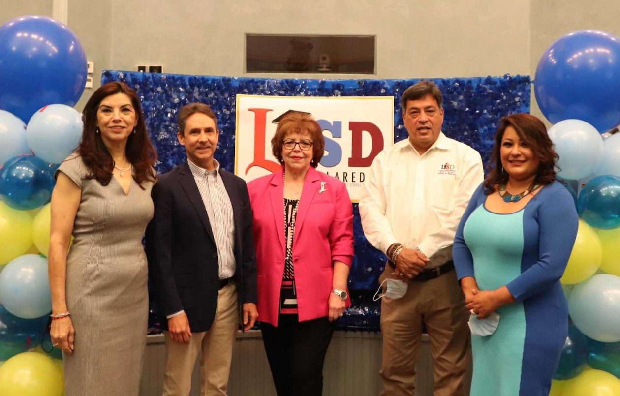 Laredo ISD officials are photographed celebrating the announcement of the district’s award of a five-year partnership with the Holdsworth Center Educational Leadership Institute.