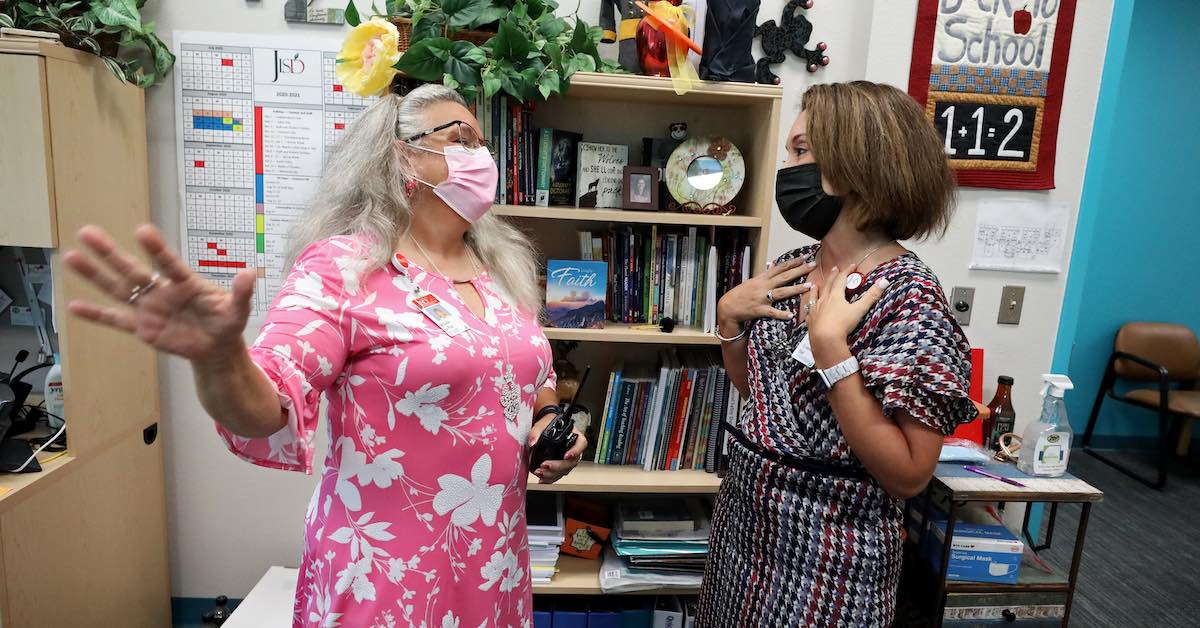 Dr. Jeanette Ball, superintendent of Judson ISD, is photographed greeting Michelle La Rue, principal of Rolling Meadows Elementary, on the first day of school.