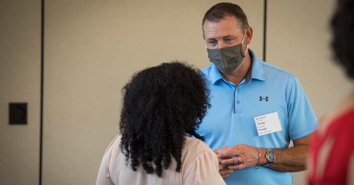 Thomas Hensley of Klein ISD is pictured listening to a colleague during a Holdsworth Center leadership session at the Campus on Lake Austin.